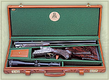 Четырехстволка с чемоданом для хранения ружей.